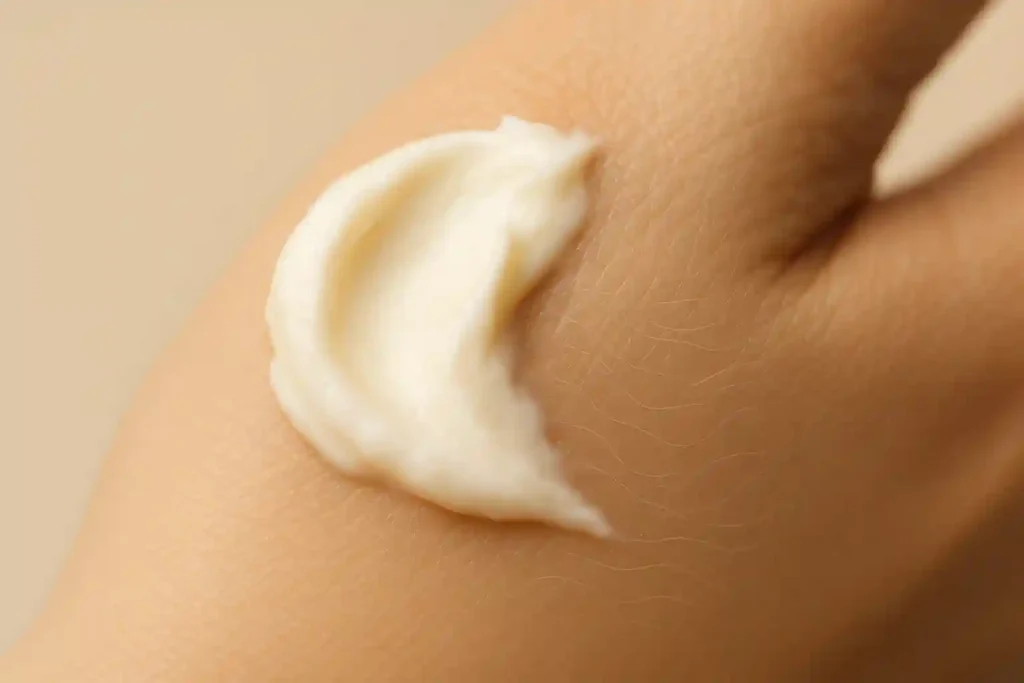 Close-up photo showing beef tallow moisturizer melting into skin, highlighting deep hydration and improved skin barrier with a soft, natural look.
